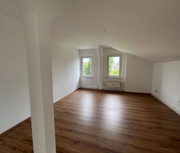 gemütliche 2,5-Raum-Wohnung im DG mit eigenem Gartenanteil - Photo 4