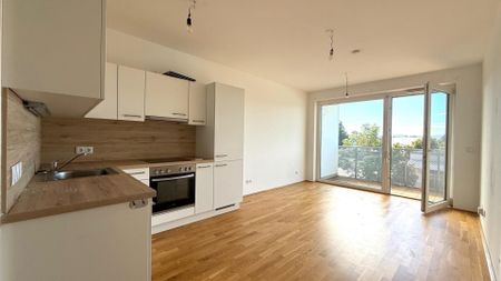 Günstige Neubauwohnung mit großer West-Loggia (6,81m²) nahe Akademiepark - Photo 2