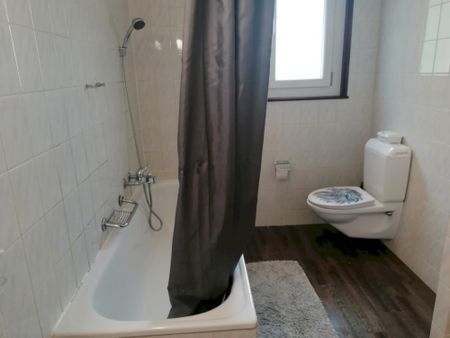 Appartement de 3.5 pièces au rez-de-chaussée - Foto 2