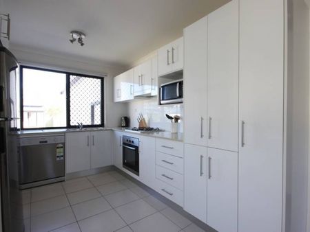 SECURE GARAGE AND FULLY FURNISHED - Photo 5