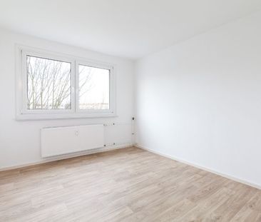 Tolle 3 Zimmer-Wohnung mit schönem Ausblick in Halle - für Sie saniert - Foto 3