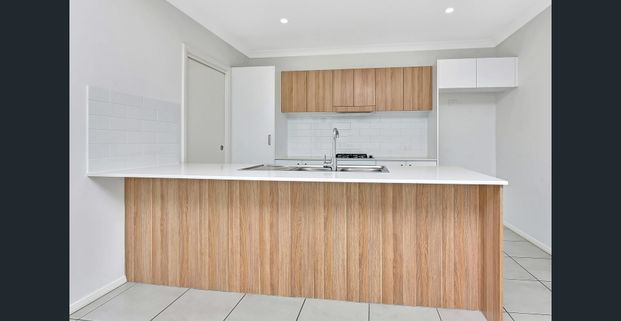 NEAR NEW LOW MAINTENANCE FAMILY HOME - Photo 1