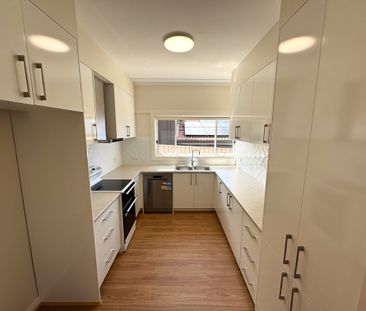 Fully & Extensively Renovated 3 Bedroom Brick Home - Like New inside - Photo 4