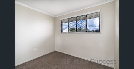 Comfortable Family Home in Sought-After Centenary Heights - Photo 3
