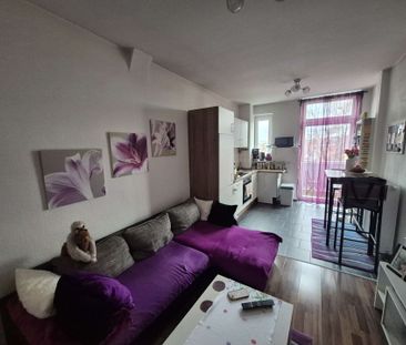 Sommer auf dem Balkon - 1,5-Raum-Wohnung im 3.OG mit Einbauküche ab... - Foto 6