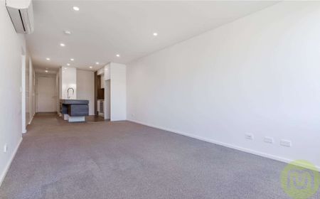 Neat and Modern Apartment in Highly Sought After Locale! - Photo 2