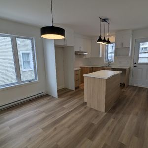 4 ½ – Triplex Neuf (Construction 2026) – Secteur résidentiel calme - Photo 2