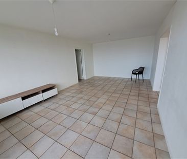 Een gunstig gelegen appartement met lift en met zicht op de skyline... - Photo 1