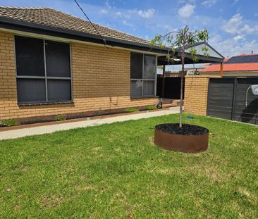 Spacious Family Comfort within Walking Distance to Shopping Centre - Photo 2