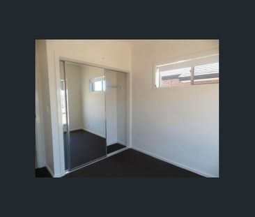 MODERN HOME CLOSE TO FACILITIES! - Photo 5