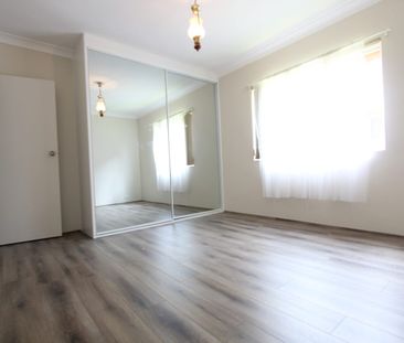 EXCELLENT 2 BEDROOM UNIT WITH GOOD SIZE LIVING AREAS - Photo 2