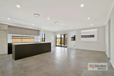 Brand New 4-Bedroom Family Home - Photo 2