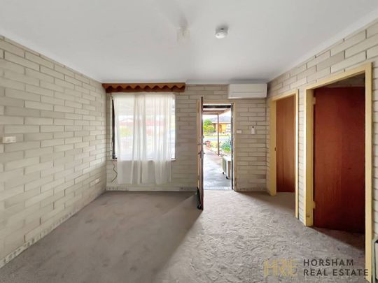 AFFORDABLE & CENTRAL UNIT - Photo 1