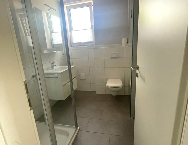 Zentrumsnah wohnen mit Balkon und Fahrstuhl! 3-Zimmer-Wohnung in Leer-Loga! - Foto 1