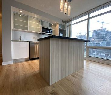 25 TELEGRAM MEWS #902 - SPACIOUS 2BR+DEN/ 1BATH, LOCKER, PARKING - Photo 1