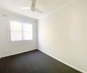 Cozy 3-Bedroom Home Near Rutherford Shopping Centre - Photo 1