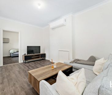 Modern & Charming 3-Bedroom - Photo 1