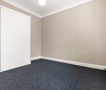 Character filled home on a level sunny block - Photo 2