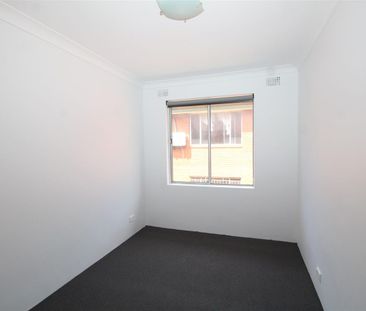 FRESHLY PAINTED RENOVATED TWO BEDROOM UNIT - Photo 1