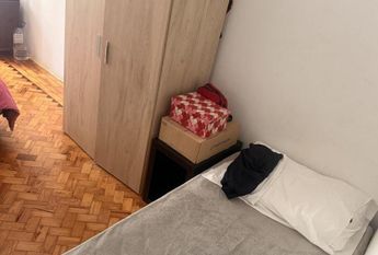 Quarto para compartilhar em Alges