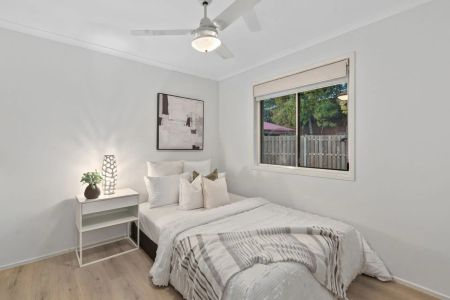 A stylish newly renovated home in one of Wishart's most sought-after pockets, perfectly positioned for families in Mansfield State School Catchment. - Photo 3