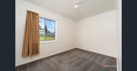 COMFORTABLE 4 BEDROOM HOME - Photo 3