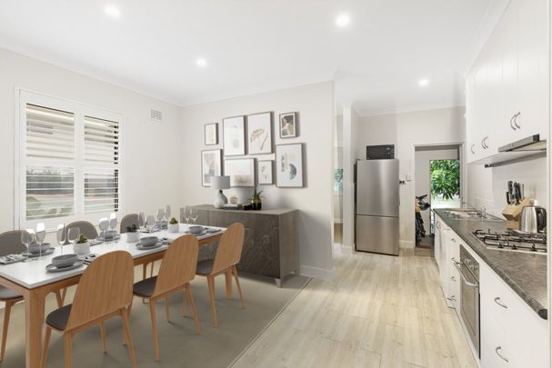 Spacious Two-Bedroom Apartment Featuring a Bright Sunroom - Photo 1