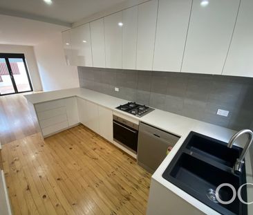 Open the Door to Comfort, Convenience and Courtyard Charm - Photo 2
