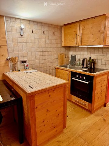 Gemütliche Wohnung mit viel Holz und alpinem Charm - Foto 4
