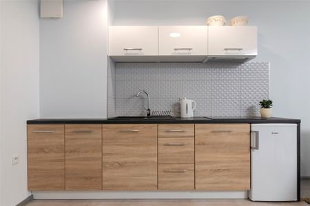 Atrakcyjna kawalerka w nowoczesnym budynku - Photo 2