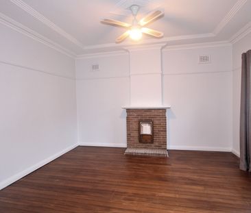 2 Bedroom Home with Sunroom, In A Great Position - Photo 1