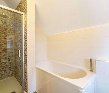 A striking two bedroom detached city home in a thriving central loc... - Photo 5