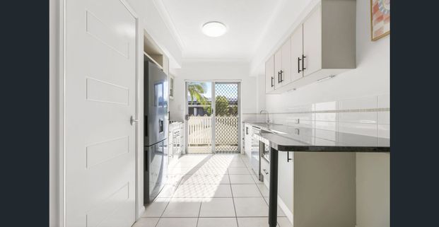 COASTAL COMFORT IN RESORT STYLE COMPLEX - Photo 1