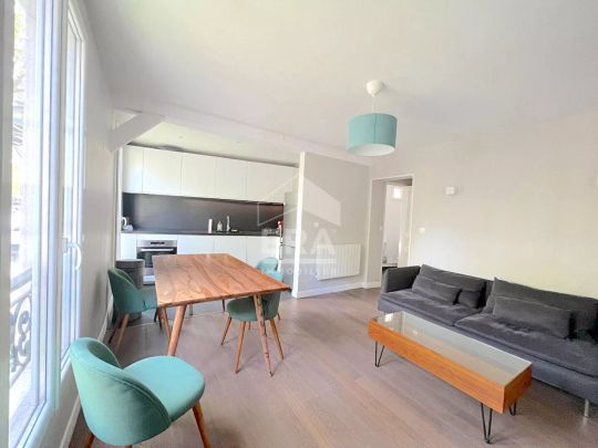 Appartement Paris 3 pièce(s) 60.29 - Photo 1