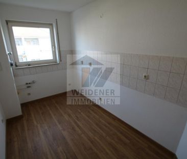Wohnfreundliche 2-Raum-Wohnung mit Balkon und Tiefgaragenstellplatz! - Foto 1