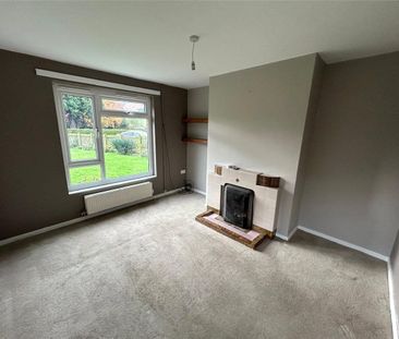 A three-bedroom semi-detached cottage located in the village of Lla... - Photo 1