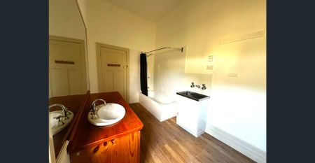 CENTRAL AND AFFORDABLE! - Photo 3