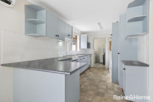 FOUR BEDROOM FAMILY HOME IN PRIME LOCATION - Photo 1