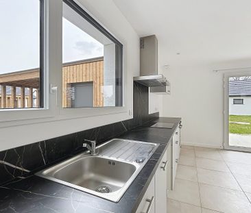 Location Maison 4 pièces 101m² THEZE 64450 - Photo 2