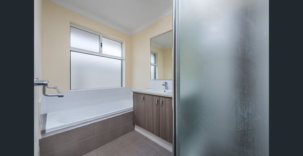 Spacious Family Living Just Minutes from the Coast! - Photo 1