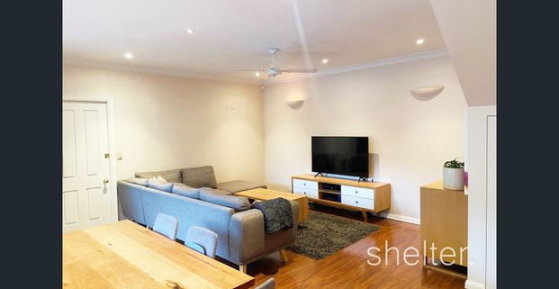 COMFORTABLE & SPACIOUS FAMILY HOME - Photo 1