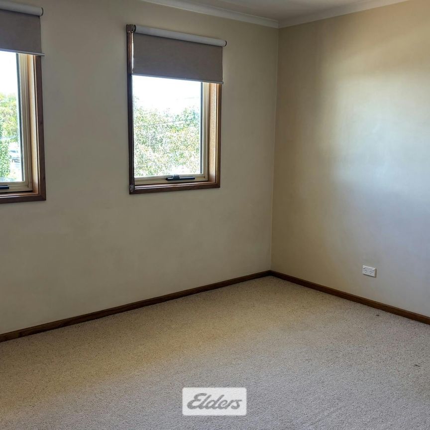 CENTRALLY LOCATED TOWNHOUSE - Photo 1