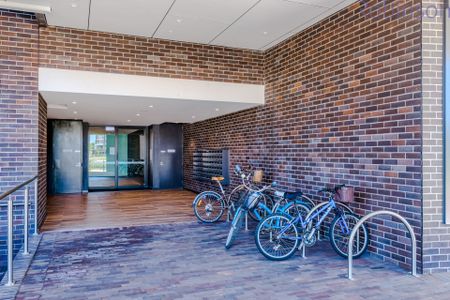 Air-conditioned apartment in the heart of Newcastle's Honeysuckle precinct. Includes parking for two vehicles! - Photo 4