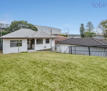 Perfectly positioned four bedroom home in a handy central location - Photo 4