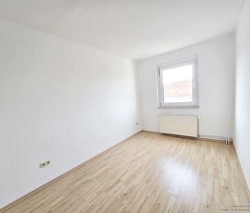 Praktische und helle 3-Raum-Wohnung im 4. OG mit flexiblen Nutzungs... - Foto 1
