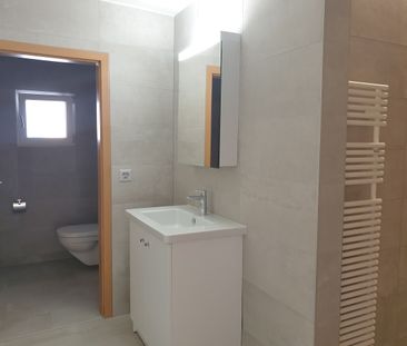 Appartement de 3,5 pièces au 1er étage avec parcelle de jardin privé - Photo 5