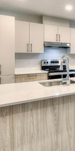 CONDO 5 1\2 FLAMBANT NEUF + 5 ÉLECTRO INCLUS + GRAND BALCON + STATIONNEMENT - Photo 4