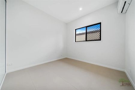 “Lovely low-set unit, one bedroom with two living spaces” - Photo 4