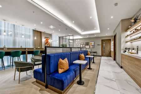 A modern apartment with large private terrace in the sought after Berkeley Eden Grove development. - Photo 2