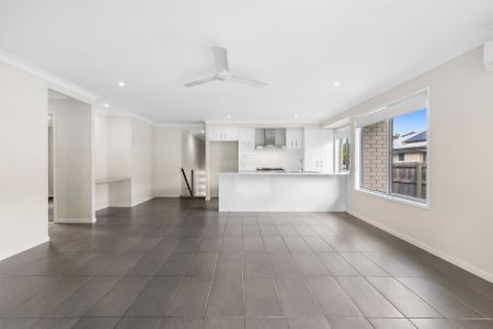 Modern Family Living in Desirable Willow Vale – Stylish 4-Bedroom Home at 48 Cassidy Crescent with Double Garage! - Photo 2